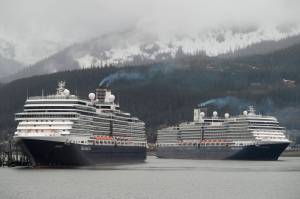 The Holland America Line cruise ships Eurodam, left, and Nieuw Amsterdam pull into Juneaus downtown harbor on May 1, 2017. (Michael Penn | Juneau Empire)