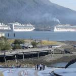 In this September 2018 photo, the Norwegian Pearl cruise ship, right, pulls into the AJ Dock in Juneau. (Michael Penn | Juneau Empire File)