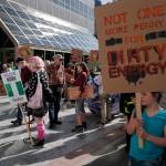 Juneau residents attend a Stand Strong for Climate rally in front of the Alaska State Capitol on Tuesday, Sept. 10, 2019. The rally included a march to Centennial Hall where the annual meeting of the International Forum of Sovereign Wealth Funds is taking place. The rally was organized by 350 Juneau, a local chapter of an international climate advocacy movement, 350.org. (Michael Penn | Juneau Empire)