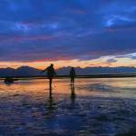 Beachgoers are silhouetted at Echo Ranch in Berners Bay, September 2019.                                Courtesy photo | Lera Jimmerson