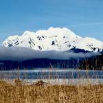 Lions Head mountain looms above a thick morning fog bank as seen from Echo Cove on April 17, 2020. (Courtesy Photo | Denise Carroll)