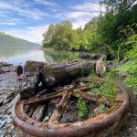 An iron wheel relic can be seen on a beach at Treadwell Cave In cove, Douglas. (Courtesy Photo | Kenneth Gill, gillfoto)