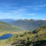 This photo shows Cropley Lake with snow-capped mountains in the distance on Sept. 16, 2020. (Courtesy Photo / Denise Carroll)