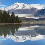 A tranquil reflection of Mendenhall glacier and surrounding newly snow-covered mountain peaks on Oct. 13. (Courtesy Photo / Denise Carroll)