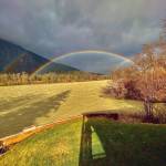 A double rainbow is seen on the Taku River on Oct. 5. The river was running high and muddy after days and days of heavy rainfall, writes Errol Champion. On that Monday afternoon there were sun breaks coupled with strong gusty winds that presented this view from my cabin which about three miles below the border with Canada. (Courtesy Photo / Errol Champion)