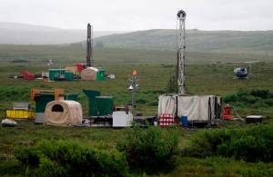 In this July 13, 2007, file photo, workers with the Pebble Mine project test drill in the Bristol Bay region of Alaska, near the village of Iliamma. (AP Photo / Al Grillo)