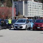 An array of electric vehicles wait to beging the Earth Day Electric Vehicle Road Rally held on Saturday, April 17. (Ben Hohenstatt / Juneau Empire)