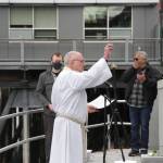 Fr. Gordon Blue takes part in the 31st annual Blessing of the Fleet and Reading of Names at the Alaska Commercial Fishermens Memorial in Juneau on May 1, 2021. (Michael S. Lockett / Juneau Empire)