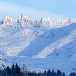 Snow-covered Mendenhall glacier and towers glisten in the morning sun’s rays on Dec. 11. (Courtesy Photo / Denise Carroll)