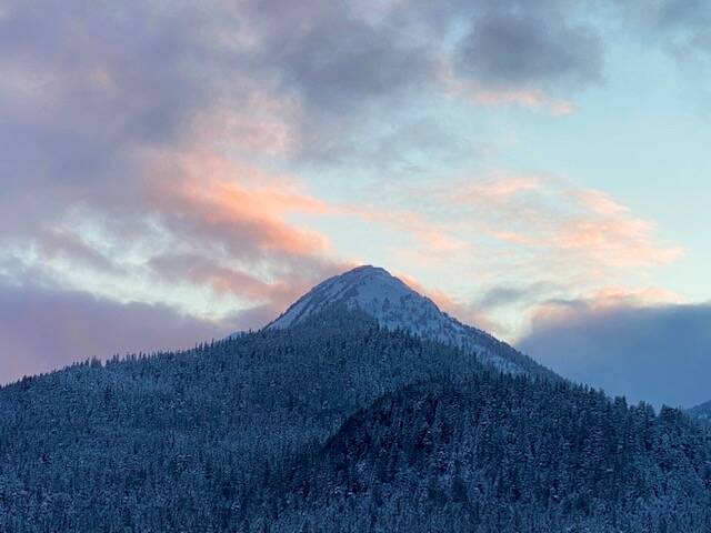 Finally, a sunset seen over Douglas Island after days of whiteout conditions on Dec. 1, 2021. (Courtesy Photo / Denise Carroll)