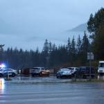 Police vehicles gather near Kaxdigoowu Héen Dei, also known as Brotherhood Bridge Trail on Sept. 21, 2022, the day police say Faith Rogers, 55, of Juneau was killed. (Ben Hohenstatt / Juneau Empire file)