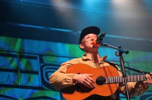 Anchorage musician Quinn Christopherson sings to the crowd during a performance as part of the final night of the Áakw Rock music festival at Centennial Hall on Sept. 23, 2023. He is the featured musician at this years Climate Fair for a Cool Planet on Saturday. (Clarise Larson / Juneau Empire file photo)