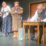 Charity collectors Peppin (played by Natalia Spenglere) and Salt played by (Roblin Gray Davis) try in vain to get a donation from Ebenezer Scrooge (played by Tom Robenolt) during Theater Alaskas production of A Christmas Carol on Sunday at McPhetres Hall. (Mark Sabbatini / Juneau Empire)