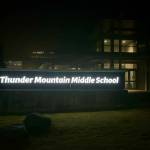 A sign at Thunder Mountain Middle School was changed in January 2025 from Thunder Mountain High School to reflect the Juneau School District consolidation that officially took effect July 1, 2024. (Jasz Garrett / Juneau Empire)
