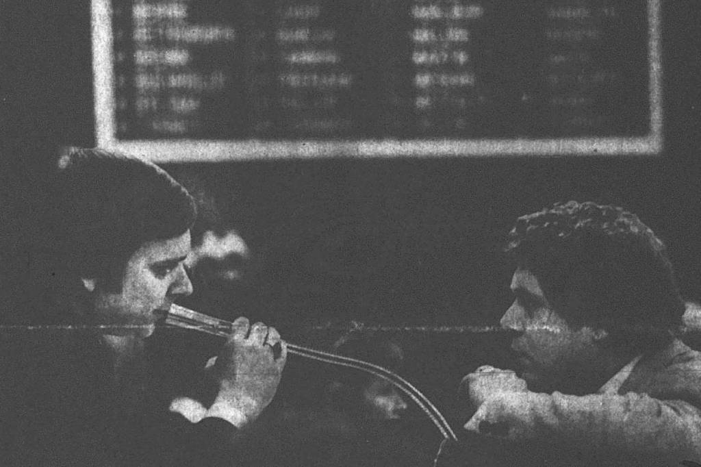 House Speaker Jim Duncan, D-Juneau, confers with Majority Leader Russ Meekins on Feb. 3, 1981, after the 22-day gridlock over House organization was broken late the previous afternoon following a series of parliamentary maneuvers. (Mark Kelley / Juneau Empire file photo)