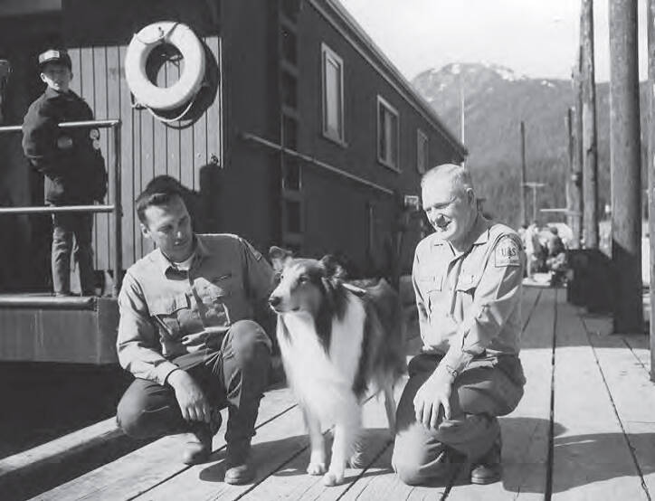 First visitor center director KJ Metcalf with Lassie and Jack Culbreath, U.S. Forest Service Director of Public Information and Education, during four episodes of TV filming in 1968. (U.S. Forest Service photo)