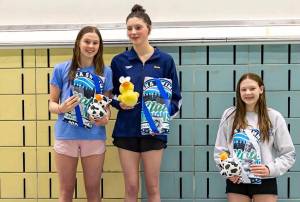 Glacier Swim Clubs Valerie Peimann and Emma Fellman tied for first place for the 15-19 girls high-point award at the Alaska Swimming State Championships last weekend in Anchorage. At right is third-placer Lelaina Trembath of Chugiak Aquatics Club (Photo courtesy GSC).