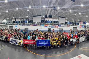 The Juneau Youth Wrestling Club pose with other clubs at the Alaska USA Wrestling 2025 Folkstyle, Greco-Roman & Freestyle State Championships on May 1-3 at the Curtis D. Menard Memorial Sports Center in Wasilla. (Photo courtesy JYWC)