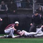 Juneau-Douglas High School: Yadaa.at Kalé sophomore Noah Lewis slides safely into home plate as Ketchikan pitcher Owen Mendoza attempts a tag during the Crimson Bears 17-7 win over the Kings on Friday at Adair-Kennedy Memorial Park. The ball was jarred loose on the play. (Klas Stolpe / Juneau Empire)
