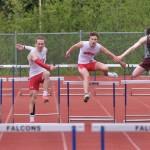 Juneau-Douglas High School: Yadaa.at Kalé's Finley Hightower and Ferguson Wheeler lead Ketchikan's Jozaiah Dela Cruz (left) and Tristen Lemerond (right) in the DI boys 300-meter hurdles during the Region V Track & Field Championships at Juneau's Thunder Mountain Middle School on Friday. (Klas Stolpe / Juneau Empire)