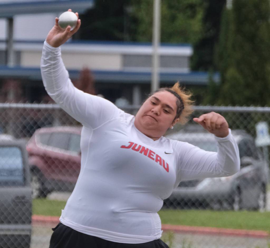 Juneau-Douglas High School: Yadaa.at Kalé senior Maxie Lehauli wins the DI girls shot put during the Region V Track & Field Championships Friday at Thunder Mountain Middle School. (Klas Stolpe / Juneau Empire)