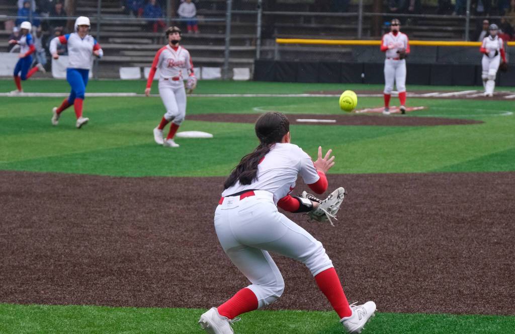 Juneau-Douglas High School: Yadaa.at Kalé softball senior center fielder Bryanna Eakes catches a fly ball against Sitka on Saturday at Adair-Kennedy Memorial Park during the Crimson Bears senior appreciation game. (Klas Stolpe / Juneau Empire)