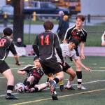 Juneau-Douglas High School: Yadaa.at Kalé senior players battle during Saturdays Crimson Bears senior appreciation game at Adair-Kennedy Memorial Park. (Klas Stolpe / Juneau Empire)