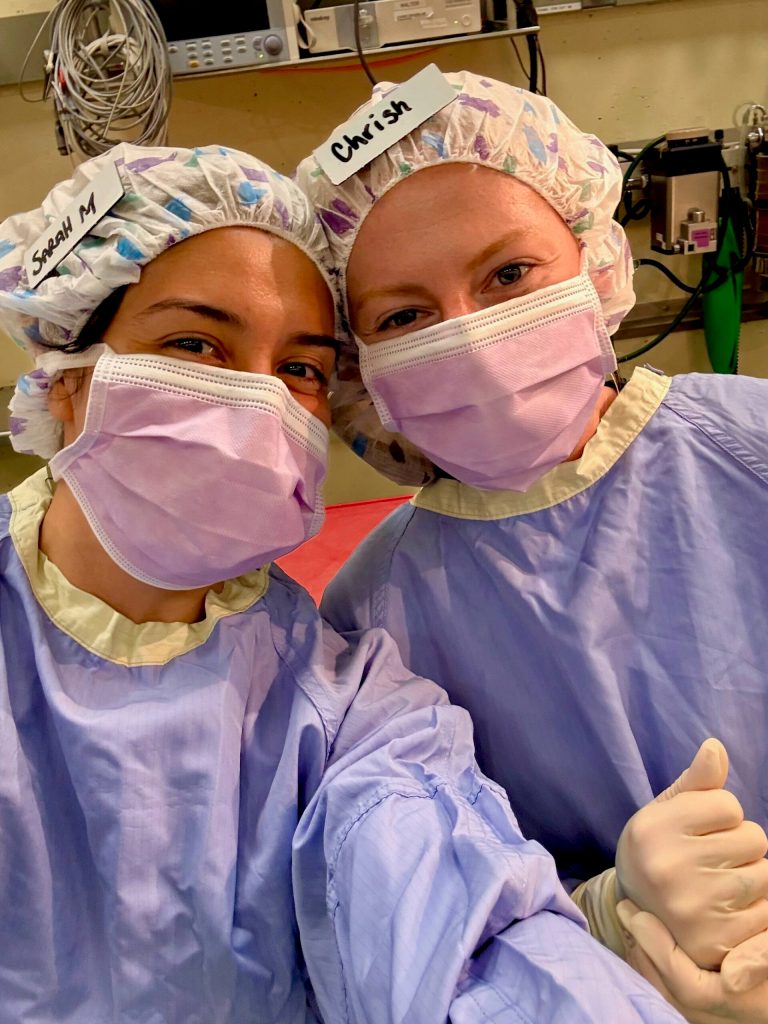Chrish Newell and friend Sarah after a mock surgery day where they got to do mass removals on dog cadavers. (Photo courtesy Chrish Newell)