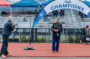 Klas Stolpe, a sports reporter for the Juneau Empire and multiple other publications since the mid-1990s, receives the Alaska School Activities Associations Gold Lifetime Pass for Region V this year during a ceremony at Thunder Mountain Middle School on Saturday. (Melissa Bastable Ganey / Mel G Photography)