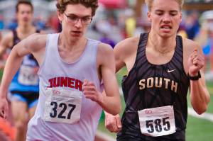 Juneau-Douglas High School: Yadaa.at Kalé senior Nick Iverson makes a move over South junior Vebjorn Flagstad in the 1,600 final during the 2025 ASAA/First Bank Alaska State Track & Field Championships on Saturday at Anchorages Dimond High School. (Klas Stolpe / Juneau Empire)