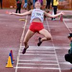 Juneau-Douglas High School: Yadaa.at Kalé senior Cailynn Baxter soars in the finals of the long jump during the 2025 ASAA/First Bank Alaska State Track & Field Championships on Saturday at Anchorages Dimond High School. (Klas Stolpe / Juneau Empire)