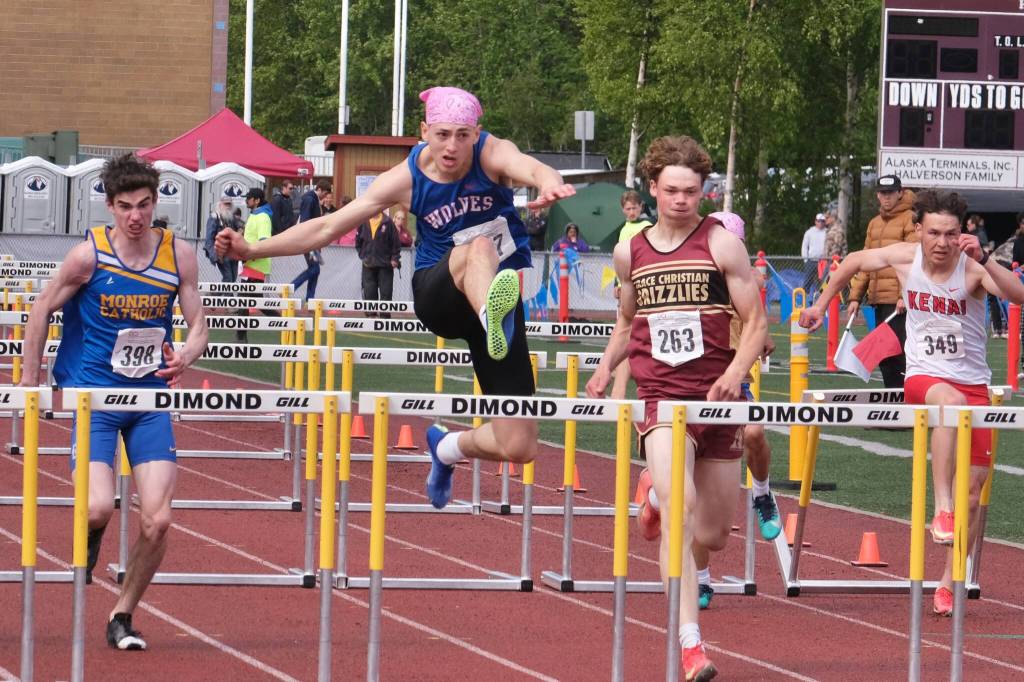 Sitka senior Rowan Olney-Miller leads the 110 meter hurdles on his way to the state title over Monroe senior Asher Mcglinchy (4th), Grace Christian junior Chris Jones (3rd) and Kenai senior Delen Byrd (2nd) during the 2025 ASAA/First Bank Alaska State Track & Field Championships on Saturday at Anchorages Dimond High School. (Klas Stolpe / Juneau Empire)