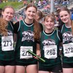 The Haines 4x200 girls relay team  (from left) Sydney Salmon, CC Elliot, Sara Jones and Ashlyn Ganey  pose after their race during the 2025 ASAA/First Bank Alaska State Track & Field Championships on Saturday at Anchorages Dimond High School. (Klas Stolpe / Juneau Empire)