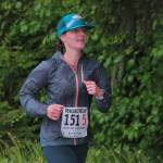 Britt Tonnessen of team Babes With Babies approaches the finish line of the Seacoast Relay at the Eagle Beach State Park outer beach picnic shelter on Sunday, June 8, 2025. (Klas Stolpe / Juneau Empire)
