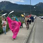 Terra Stark leads participants in a No Kings protest down Egan Drive on Saturday, June 14, 2025. (Mark Sabbatini / Juneau Empire)