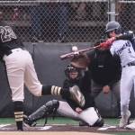 Juneaus Auke Bay Post 25 batter Hunter Carte (4) connects on a pitch against Anchorages South Post 4 pitcher David Feigner (23) during Alaska American Legion baseball action Saturday at Adair-Kennedy Memorial Park. (Klas Stolpe / Juneau Empire)