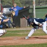 Photo by Jeff Helminiak / Peninsula Clarion
Jacob Katasse of Auke Bay Post 25 ducks under a pitch in front of catcher Conner Mitchuson of Madisonville (Kentucky) Post 6 on Friday, June 20 in the Lance Coz Wood Bat Tournament at Coral Seymour Memorial Park in Kenai .