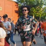 The mens 5K winner Joey Dyson sets off from the start line on Friday, June 20, 2025. (Natalie Buttner / Juneau Empire)
