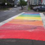 The rainbow crosswalk in downtown Juneau, freshly painted for Pride Month, has already been damaged by skid marks. (Natalie Buttner / Juneau Empire)