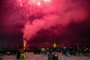 People watch the fireworks after midnight on Friday, July 4<ins>, </ins><ins>2025</ins>. (Jasz Garrett / Juneau Empire)