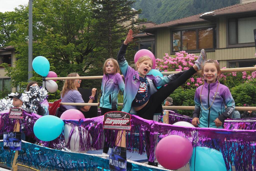 Dancers perform on the TAFY Dance Alaskas float, which won first place for best youth float during the 2025 downtown Juneau Fourth of July parade. (Natalie Buttner / Juneau Empire)