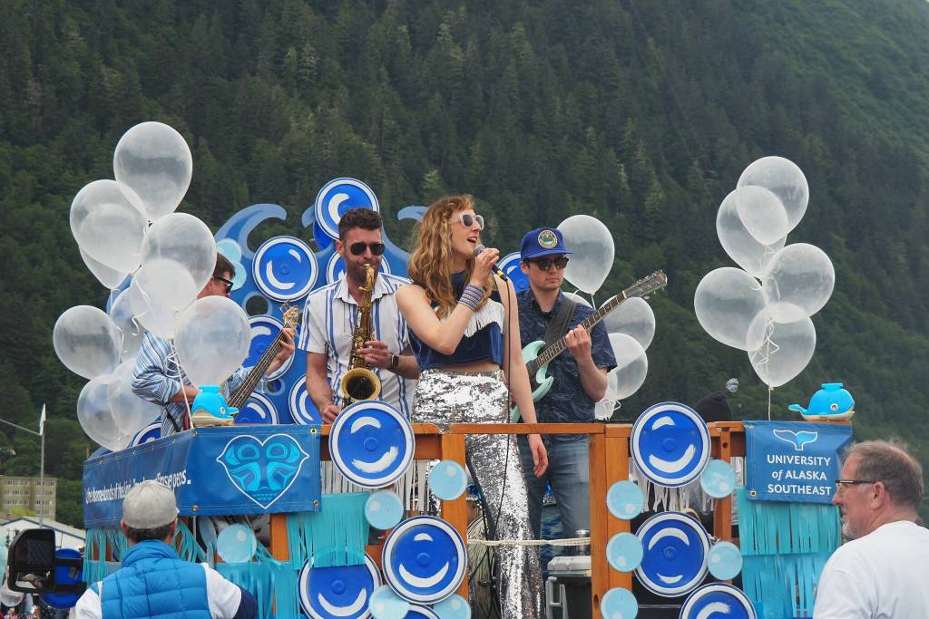The Royal Wedding Band performs live during the 2025 downtown Juneau Fourth of July parade. Members of the band include Taylor Vidic, Allan Young, Tim Powers, David Elrod and Jason Hort. (Natalie Buttner / Juneau Empire)