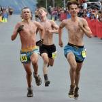 Anchorages Ole Reese, 15; Sewards Ridge Conant, 16; and Eagle Rivers Cohen Galloway, 17, race to the line in the junior boys race at the Mount Marathon Race on July 4, 2025, in Seward, Alaska. (Photo by Jeff Helminiak/Peninsula Clarion)