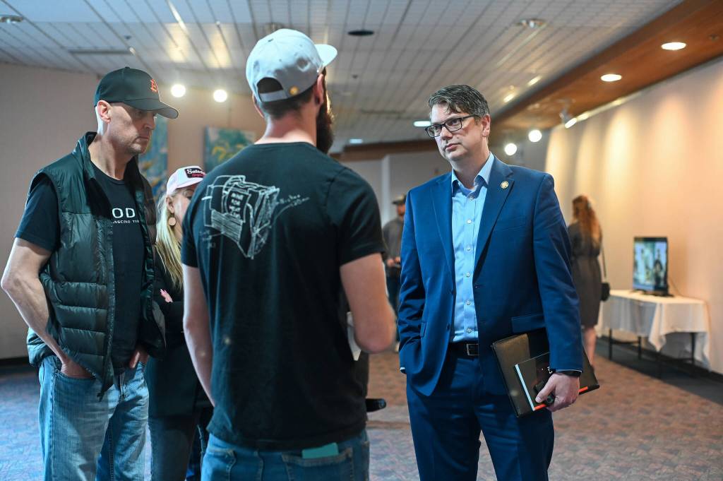 Rep. Nick Begich III (R-Alaska) takes questions from bitcoin supporters at the first Bitcoin Alaska conference on Sunday, July 6, 2025. (Jasz Garrett / Juneau Empire)