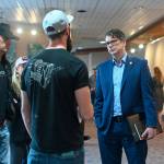 Rep. Nick Begich III (R-Alaska) takes questions from bitcoin supporters at the first Bitcoin Alaska conference on Sunday, July 6, 2025. (Jasz Garrett / Juneau Empire)