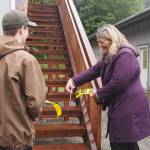 Max Webster watches Department of Corrections Commissioner Jen Winkelman cut the ribbon on the steps to leading up to the second story of the tower on Tuesday, July 9, 2025. (Natalie Buttner / Juneau Empire)