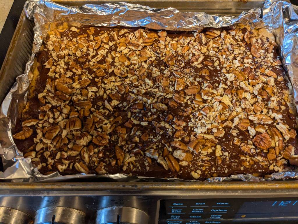 Toasted nuts top this shortbread cookie bar. (Photo by Patty Schied)