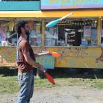 A juggler smiles during Salmonfest 2025 on Friday, Aug. 2, at the Kenai Peninsula Fairgrounds in Ninilchik. (Chloe Pleznac/Homer News)