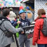 Cook Inletkeeper communications director (center) Jamie Currie shares salmon trivia with Salmonfest attendees in the Causeway on Saturday, Aug. 2, 2025, at the Kenai Peninsula Fairgrounds in Ninilchik, Alaska. (Delcenia Cosman/Homer News)