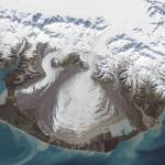 Malaspina Glacier spills out toward the Gulf of Alaska in this 2014 image. (Image courtesy of NASA Earth Observatory)